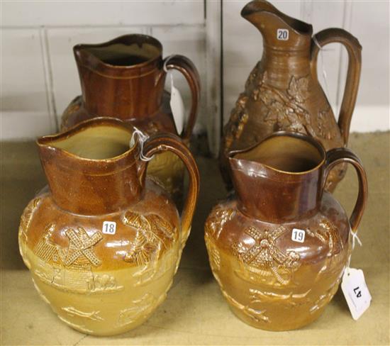 Four salt-glazed stoneware hunting and harvest jugs